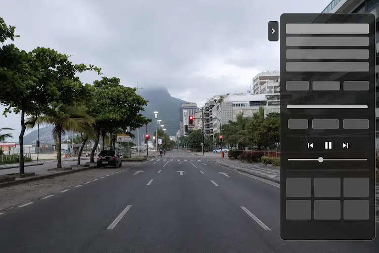 nterface do Drive & Listen sobre uma avenida no Rio de Janeiro, mostrando uma experiência de viagem virtual com painel lateral de controles.